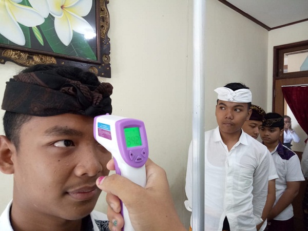 Langkah Denpasar Antisipasi Virus Corona, Gelar Sosialisasi, Siagakan Sanitizer Hingga Pengecekan Suhu Tubuh di Fasilitas Publik